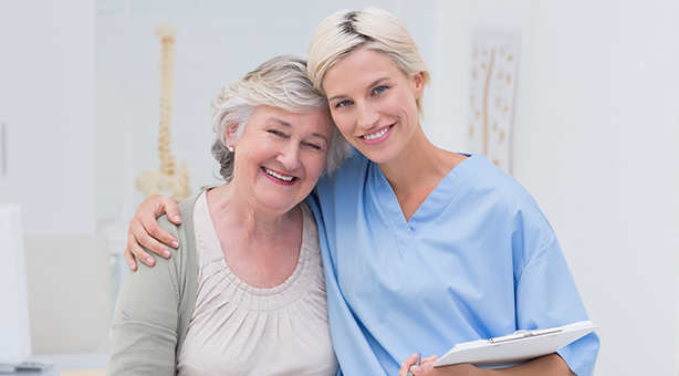 Happy senior and caregiver What-Makes-Us-Different-Assisting-Hands-Arlington-Heights-IL