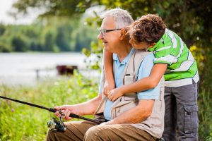 Senior fishing with Grandson