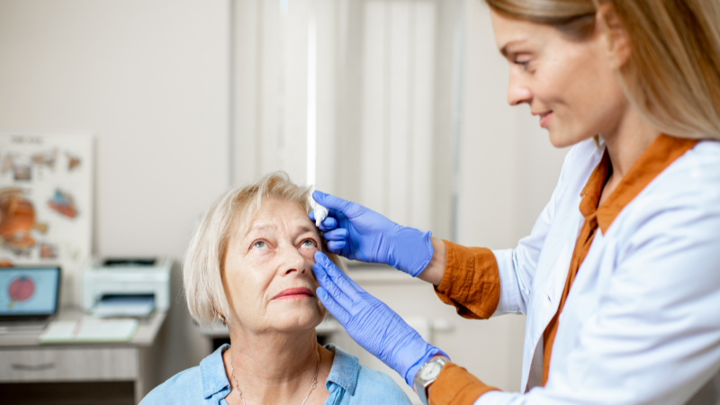 How do caregivers support a senior after eye surgery