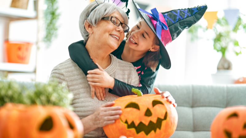grandmother and child celebrate Halloween together